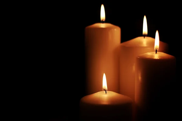Luce di candela isolata nera — Foto Stock