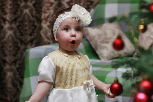 Child decorate the Christmas tree toy — Stock Photo, Image