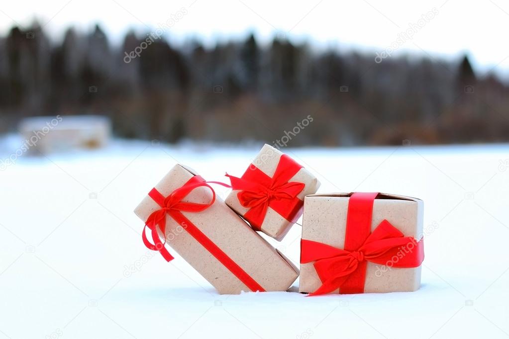 gift box on the snow bow landscape