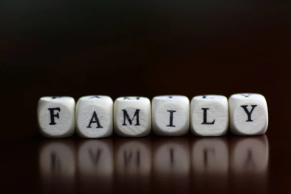 Text family letter cube — Stock Photo, Image
