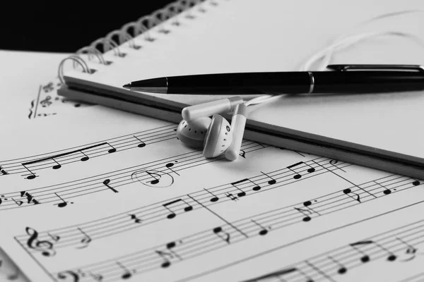 Sheet music with a number of accessories — Stock Photo, Image