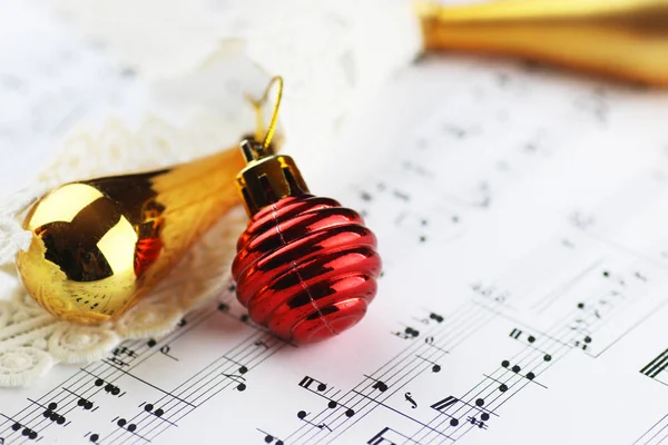 Notes and Christmas balls — Stock Photo, Image