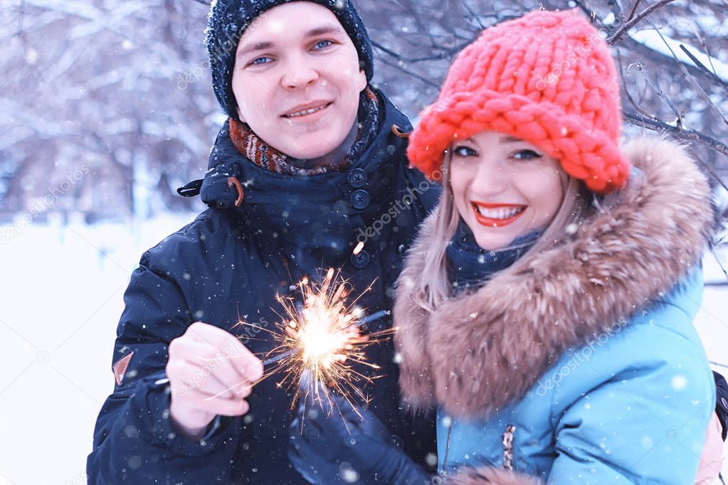 couple lovers with sparklers happiness