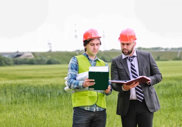 man with cottage plan construction