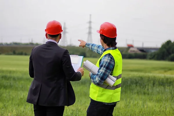 construction two man in the field