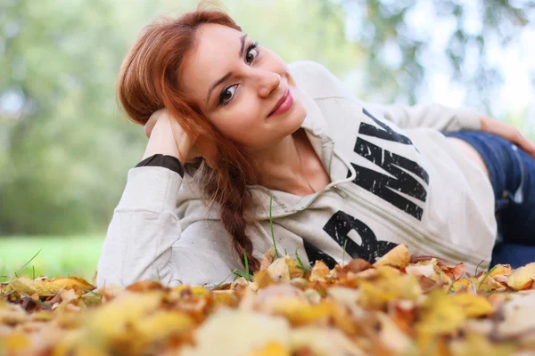 Autumn leaves girl book casual — Stock Photo, Image