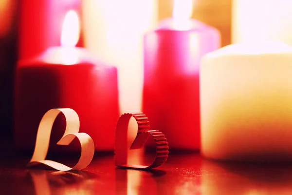 Makro svíčka světle s tvar srdce — Stock fotografie