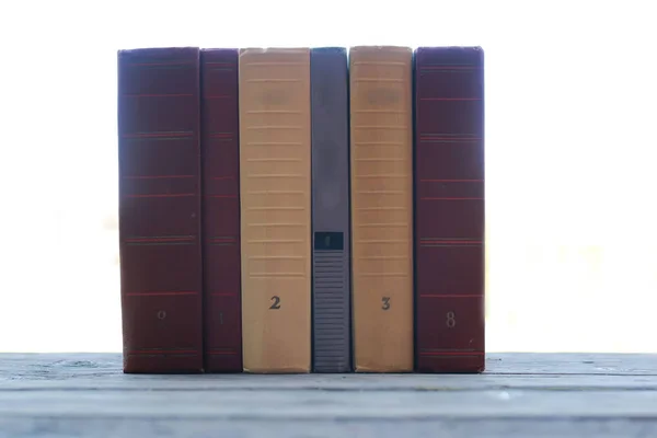 Books standing on a table — Stock Photo, Image