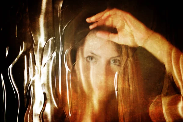 Scratched dirty effect on photo girl face behind dirty glass — Stock Photo, Image
