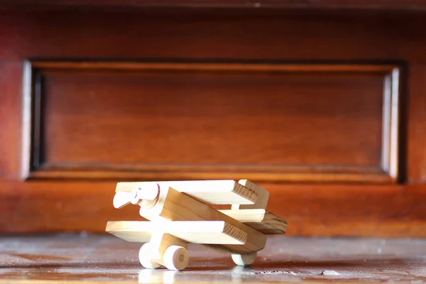 wooden toy airplane on the table