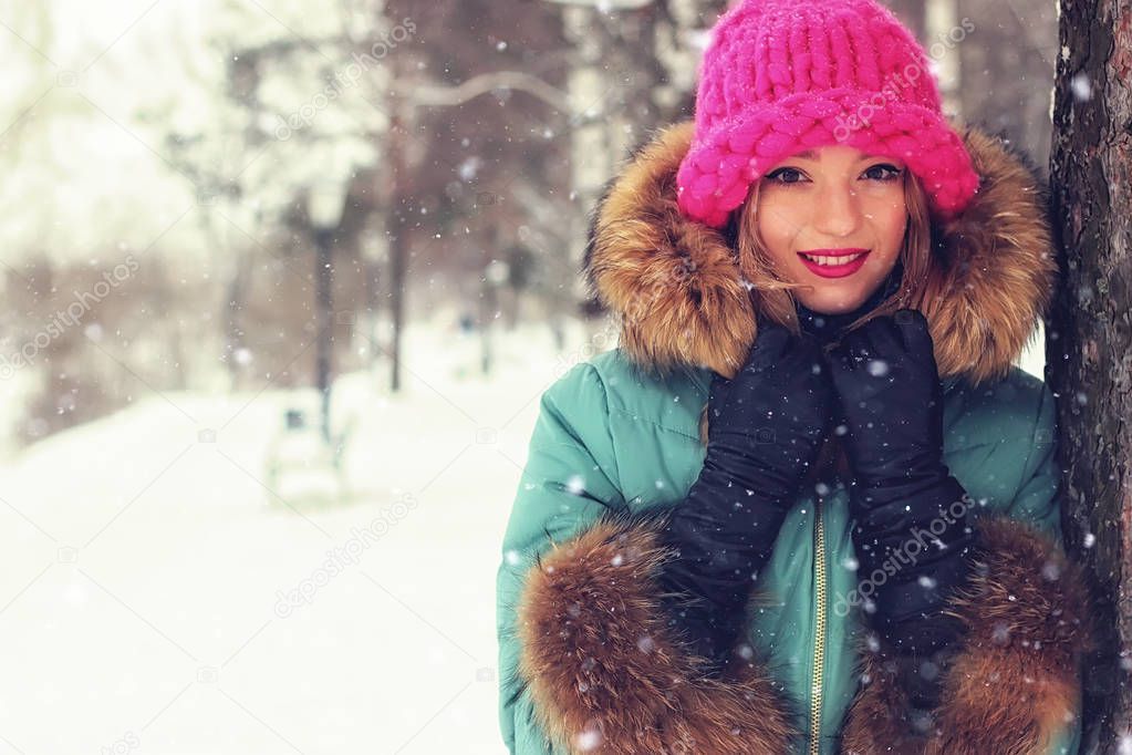 girl in winter street bench