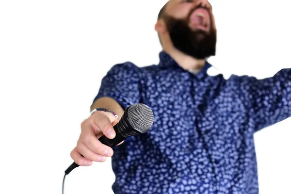 Microphone on stage hand hold — Stock Photo, Image