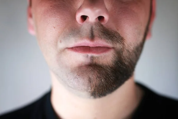 Bearded man shaving — Stock Photo, Image