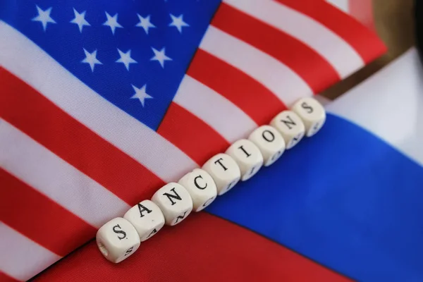 Russian and usa flag sanctions — Stock Photo, Image