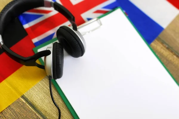 Blank paper on wooden textural desk with mobile phone — Stock Photo, Image