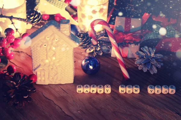 New year table pine cone and candle — Stock Photo, Image