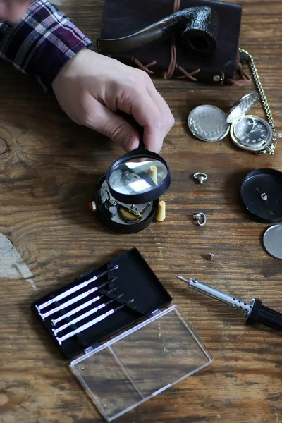 watch clock repair retro concept working hard in a past