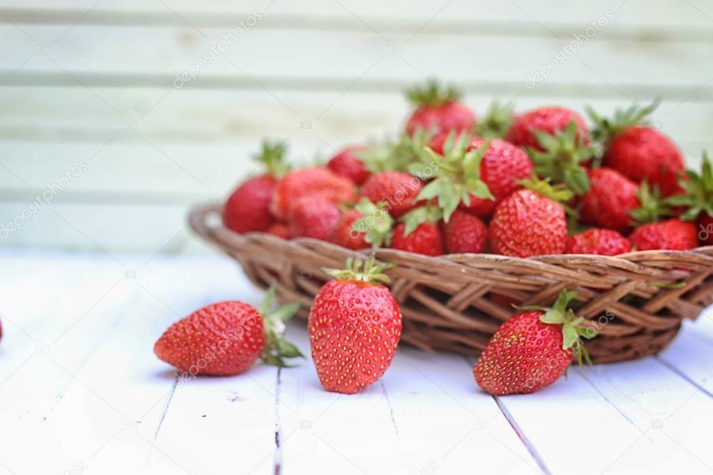 Strawberry on wicker bag outdoor