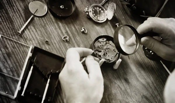 Black and white photo watch clock repairing — Stock Photo, Image