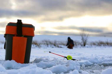 Little winter fishing rod ice clipart
