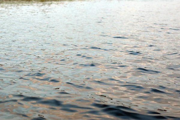 Water texture sunset — Stock Photo, Image