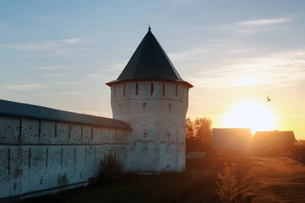 Brick cathedral fortress medieval Christian era at sunset — Stock Photo, Image