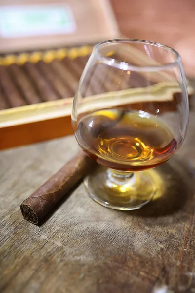 Large box of Cuban cigars on a wooden table — Stock Photo, Image