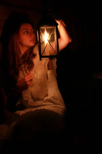 Woman candle lamp dark night — Stock Photo, Image