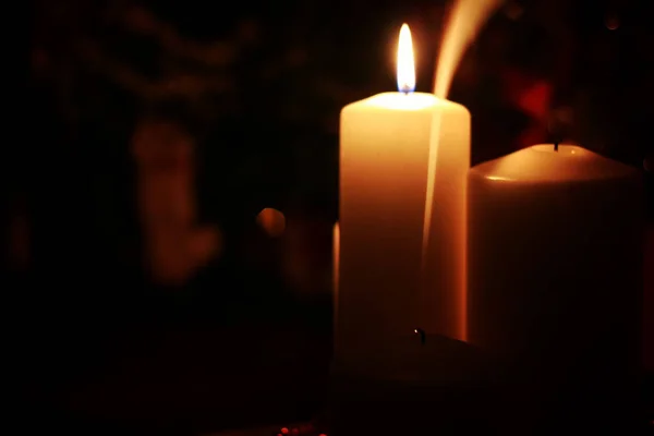 Luz de vela isolado preto — Fotografia de Stock
