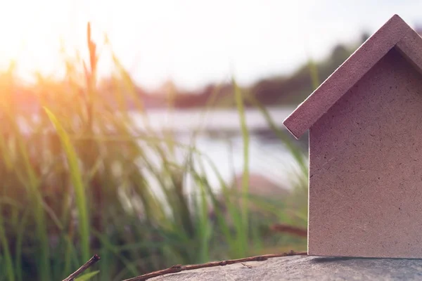 In the shape of a house a wooden figure — Stock Photo, Image