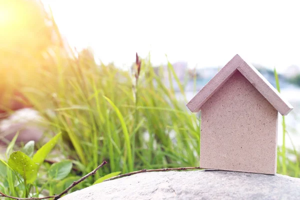 In the shape of a house a wooden figure — Stock Photo, Image