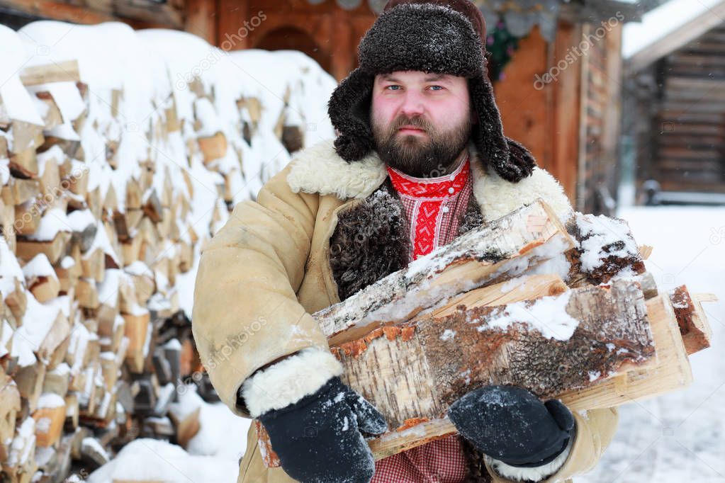 Traditional winter costume of peasant medieval age in russia