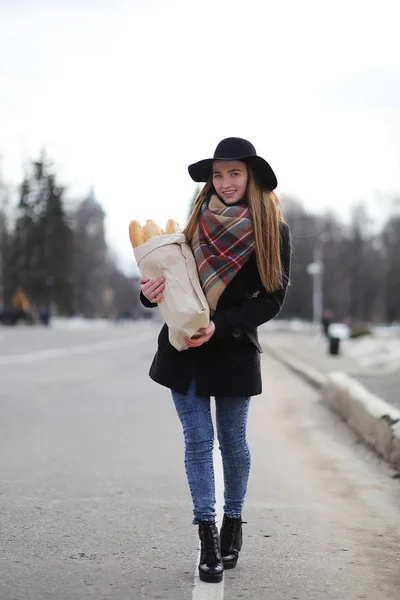 French woman with baguettes in the bag — Stock Photo, Image