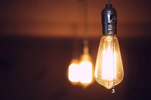 Lamps with tungsten filament. Edisons light bulb. Filament fila