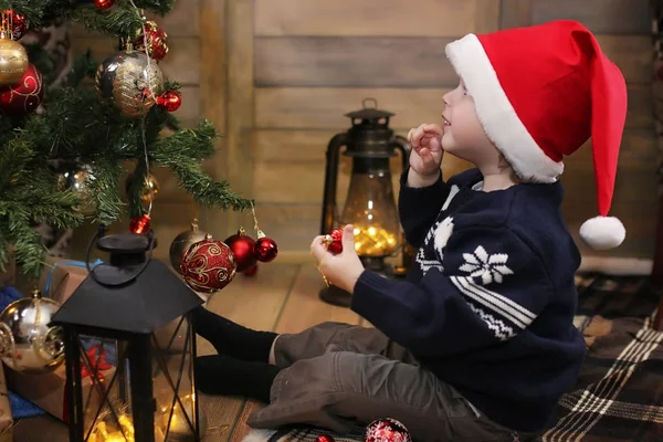 Little child and Christmas toys — Stock Photo, Image