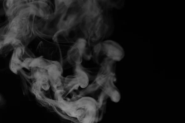 White smoke on a black background. Texture of smoke. Clubs of wh — Stock Photo, Image