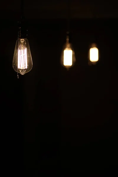 Lamps with tungsten filament. Edisons light bulb. Filament fila