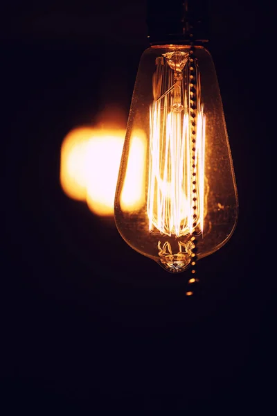 Lamps with tungsten filament. Edisons light bulb. Filament fila