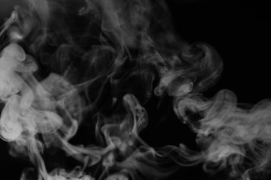 Beyaz Siyah bir arka plan üzerinde duman. Doku duman. Wh kulüpleri