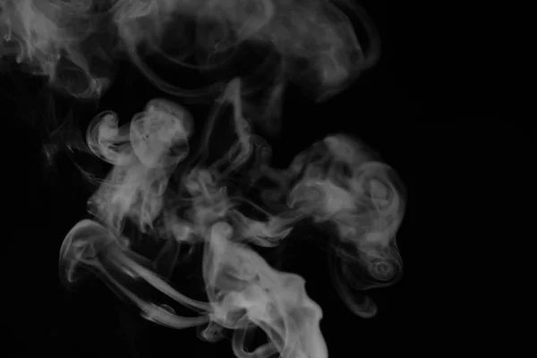 White smoke on a black background. Texture of smoke. Clubs of wh — Stock Photo, Image