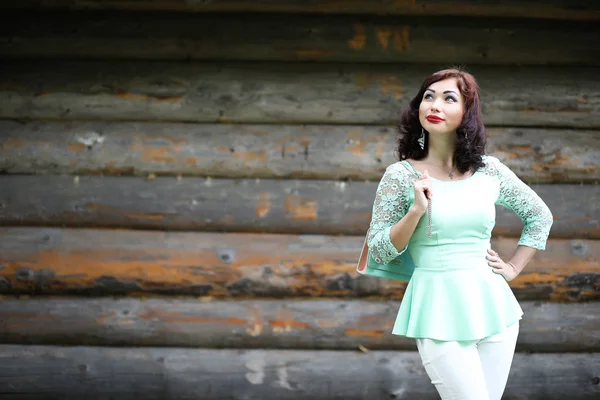 Beautiful girl in a spring leaf park — Stock Photo, Image