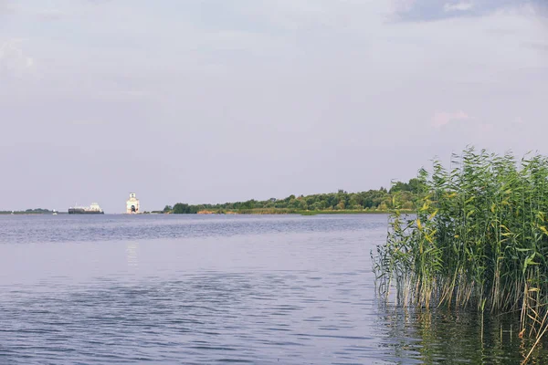 Landscape lake. Texture of water. The lake is at dawn. The mouth