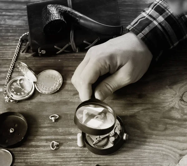 Black and white photo watch clock repairing — Stock Photo, Image