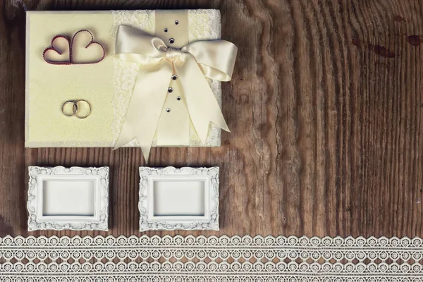 Wedding ring invitation wood background Stock Picture