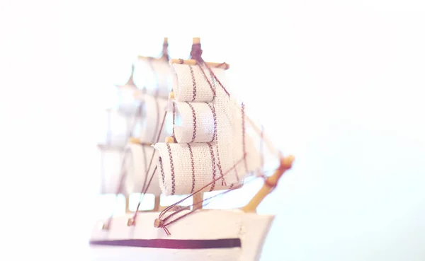 Old wooden ship with sails and masts toy on a stand. Vintage and — Stock Photo, Image