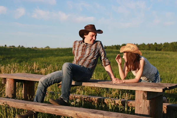 Cute couple on a walk by the countryside — Stock Photo, Image