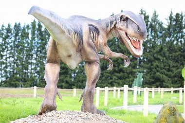 Dinozorlar Park. Bir dinazor doğa arka plan üzerinde. Oyuncak d