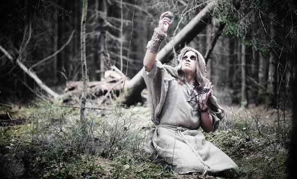 Fairy magician. A sorcerer with a glass sphere, a magical spell — Stock Photo, Image