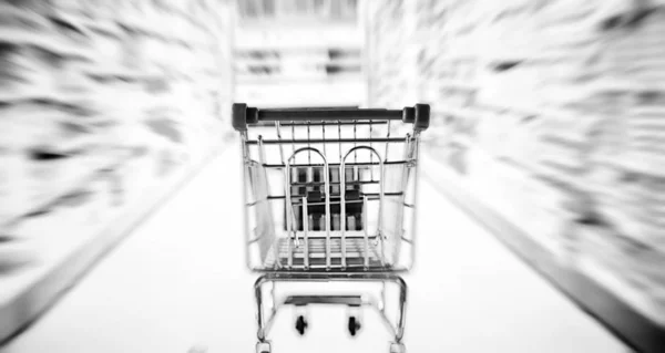 Background shopping trolley. Concept of shopping for groceries a — Zdjęcie stockowe