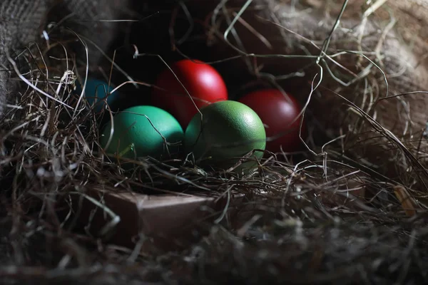 Easter painted eggs on burlap — Stock Photo, Image